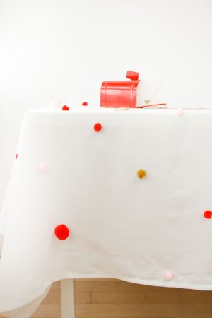 DIY pom pom tablecloth by Studio DIY for The Sweetest Occasion DIY pom pom tablecloth by Studio DIY for The Sweetest Occasion